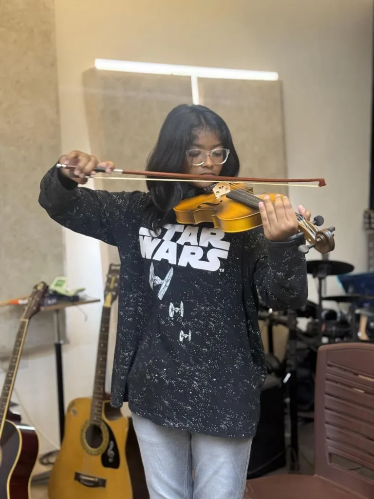 A student playing violin